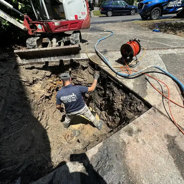 Antons plumber exposing underground drainage for inspection and repair