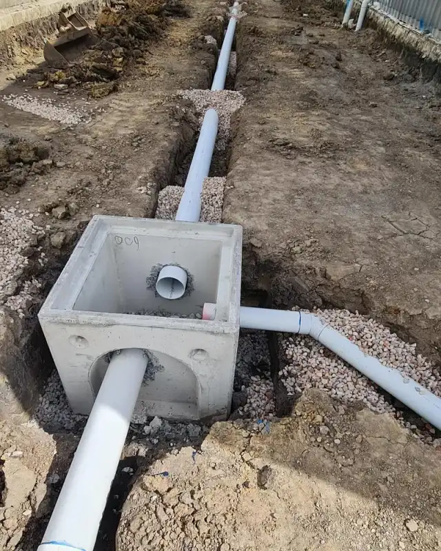 Stormwater pits and connecting pipes exposed during drainage installation